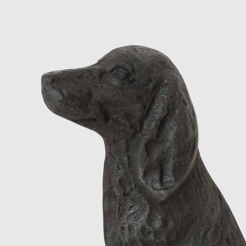 cast iron dog figure.